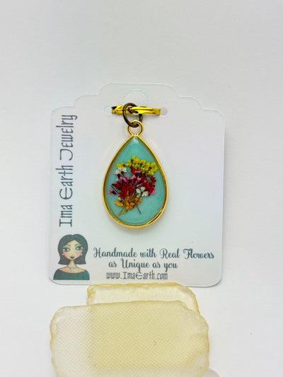 Real Flowers in Resin Pendant -  over Turquoise Blue • Gold Frame