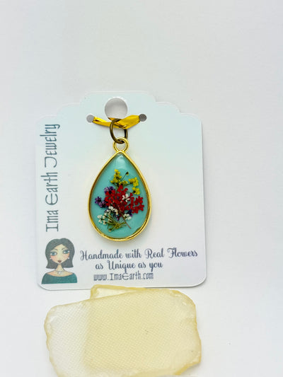 Real Flowers in Resin Pendant -  over Turquoise Blue • Gold Frame