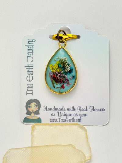 Real Flowers in Resin Pendant -  over Turquoise Blue • Gold Frame