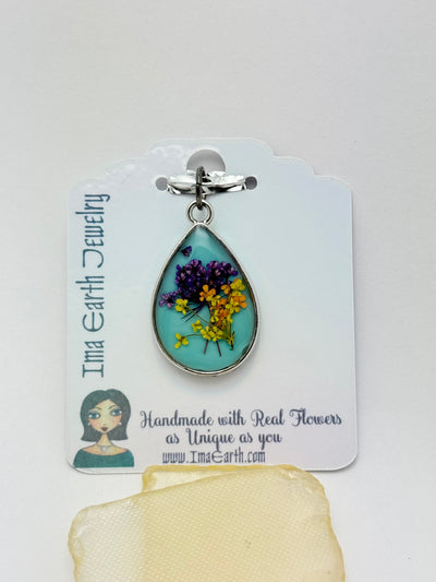 Real Flowers in Resin Pendant -  over Turquoise Blue • Silver Frame