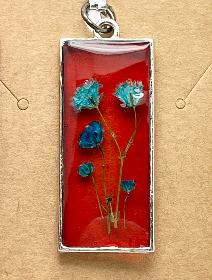 Real Flowers in Resin Pendant - Turquoise / Blue Flowers 💙 over Translucent Red Resin ❤️ • Silver Frame