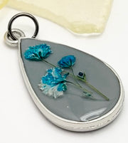 Real Flowers in Resin Pendant - Blue/Turquoise Resin over Grey Resin • Silver Frame