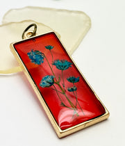 Real Flowers in Resin Pendant - Turquoise / Blue Flowers 💙 over Translucent Red Resin ❤️ • Gold Frame