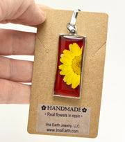 Real Flowers in Resin Pendant - Yellow Daisy 💛 over Translucent Red Resin ❤️ • Gold Frame