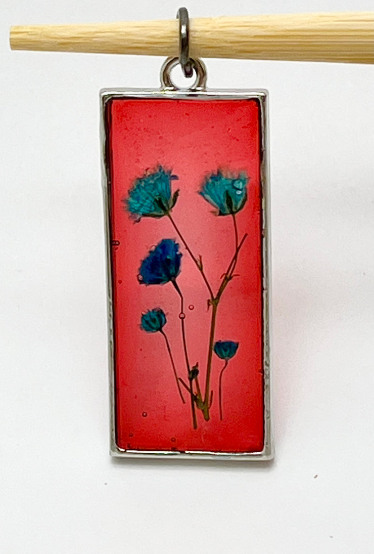 Real Flowers in Resin Pendant - Turquoise / Blue Flowers 💙 over Translucent Red Resin ❤️ • Silver Frame