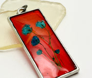 Real Flowers in Resin Pendant - Turquoise / Blue Flowers 💙 over Translucent Red Resin ❤️ • Silver Frame