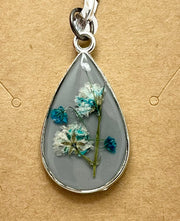 Real Flowers in Resin Pendant - Blue/Turquoise Resin over Grey Resin • Silver Frame