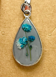 Real Flowers in Resin Pendant - Blue/Turquoise Resin over Grey Resin • Silver Frame