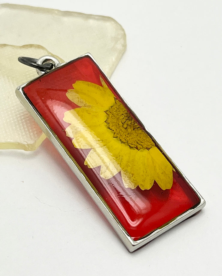 Real Flowers in Resin Pendant - Yellow Daisy 💛 over Translucent Red Resin ❤️ • Gold Frame