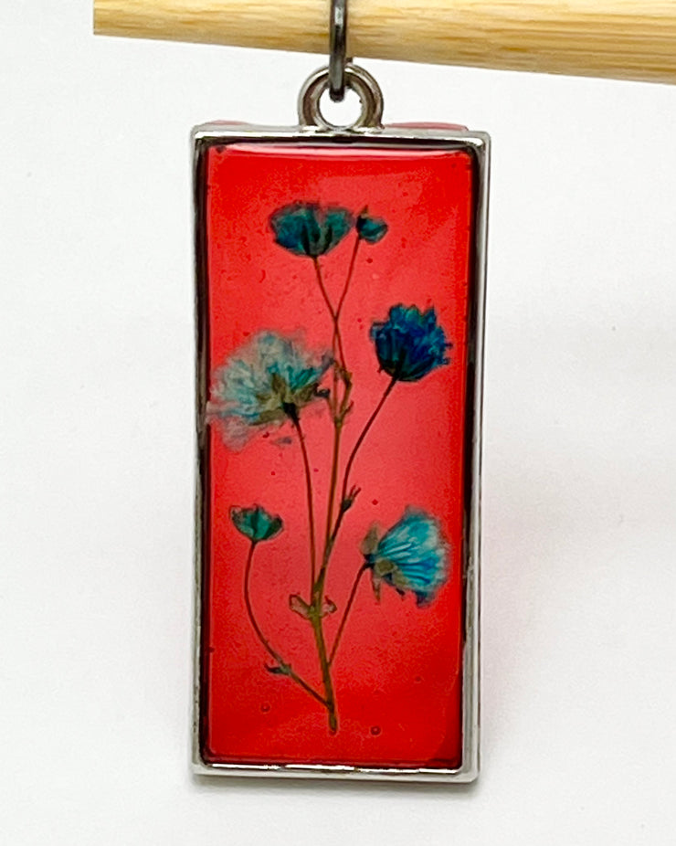 Real Flowers in Resin Pendant - Turquoise / Blue Flowers 💙 over Translucent Red Resin ❤️ • Silver Frame