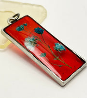 Real Flowers in Resin Pendant - Turquoise / Blue Flowers 💙 over Translucent Red Resin ❤️ • Silver Frame