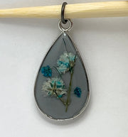 Real Flowers in Resin Pendant - Blue/Turquoise Resin over Grey Resin • Silver Frame