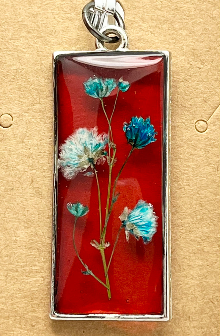 Real Flowers in Resin Pendant - Turquoise / Blue Flowers 💙 over Translucent Red Resin ❤️ • Silver Frame